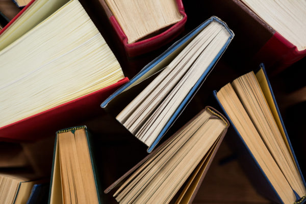 Close-up of books arranged